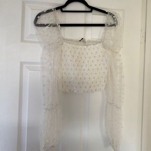White Polka dot puffy sleeve crop top.